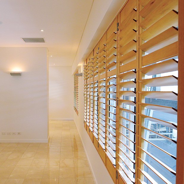 Curtains on Cavenagh Custom Timber Shutters